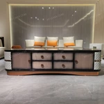 Luxury Coffee Table with Quilted Upholstered Panels Natural Wood Veneer Finish and Stainless Steel Accents